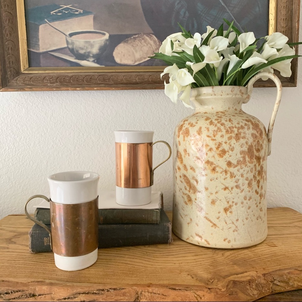 Vintage copper mugs with brass handles